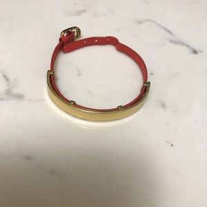 Gold tone and red leather bracelet